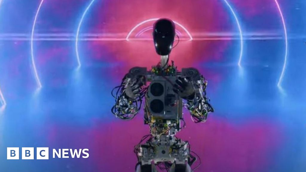 Tesla shows walking Optimus prototype at AI Day 2022