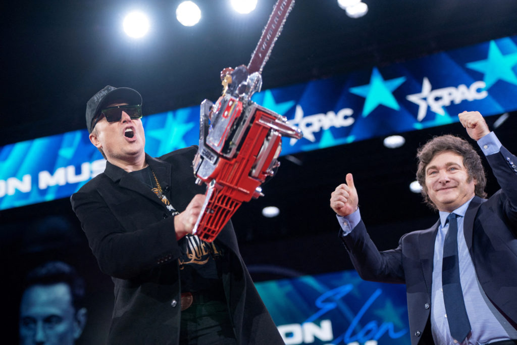 Musk waves a 'chainsaw for bureaucracy' at CPAC
