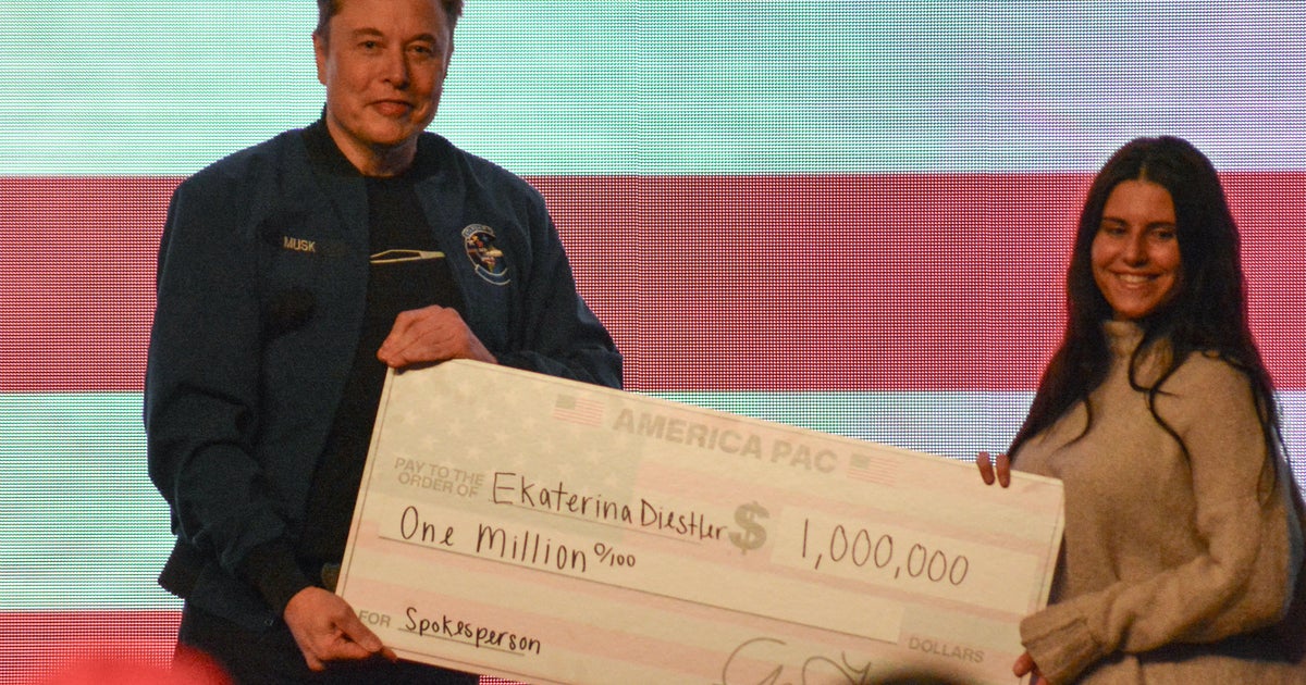 Musk hands $1M checks to Wisconsin voters before court election